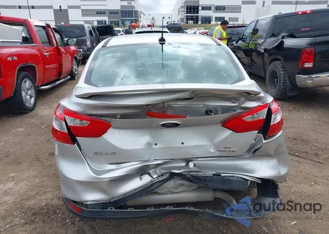 2014 Ford Focus Se z USA, uszkodzony, nr VIN 1FADP3F21EL320009